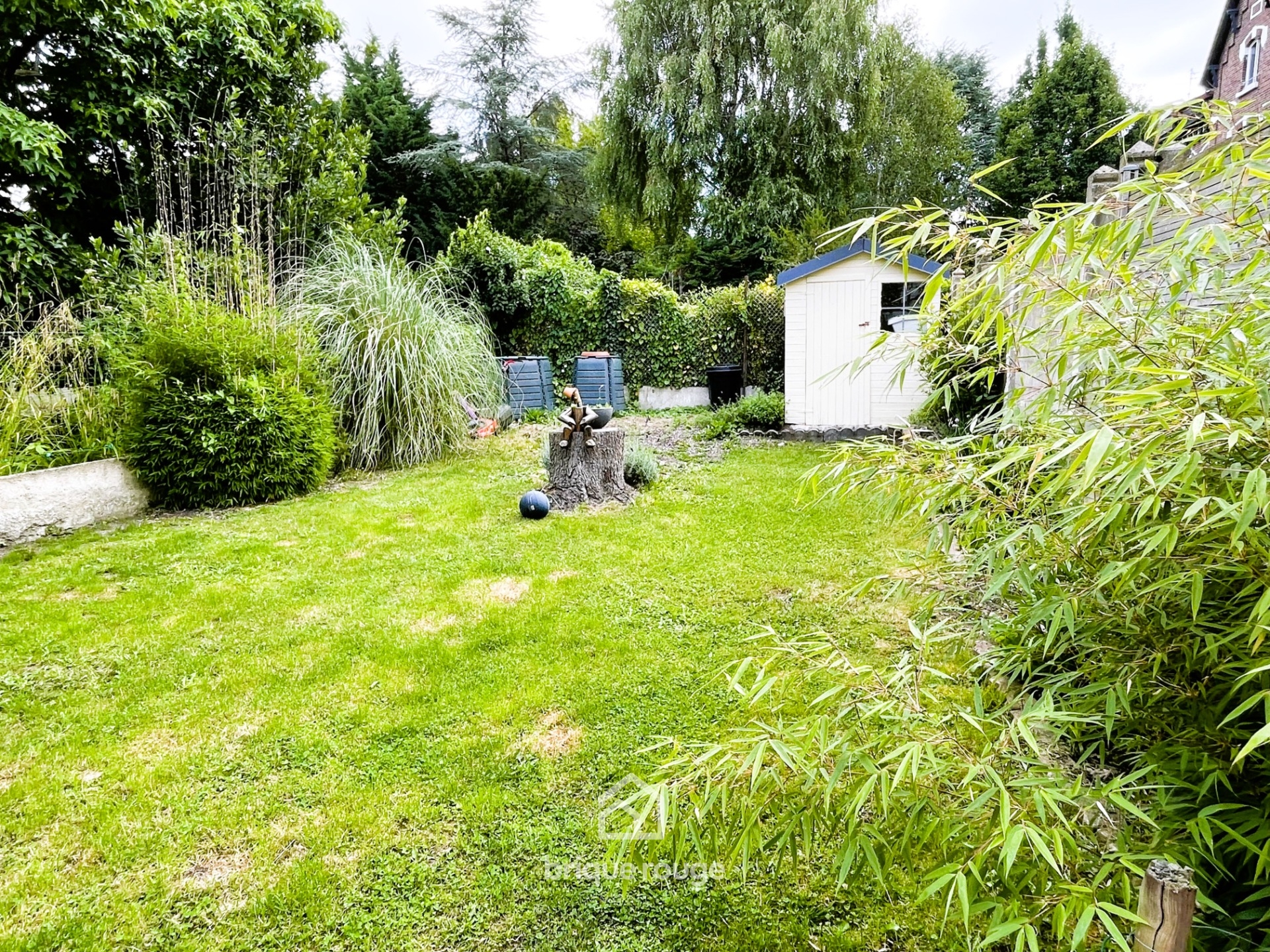 Maison 3 chambres avec jardin et garage secteur convoite Photo 1 - Brique Rouge Immobilier