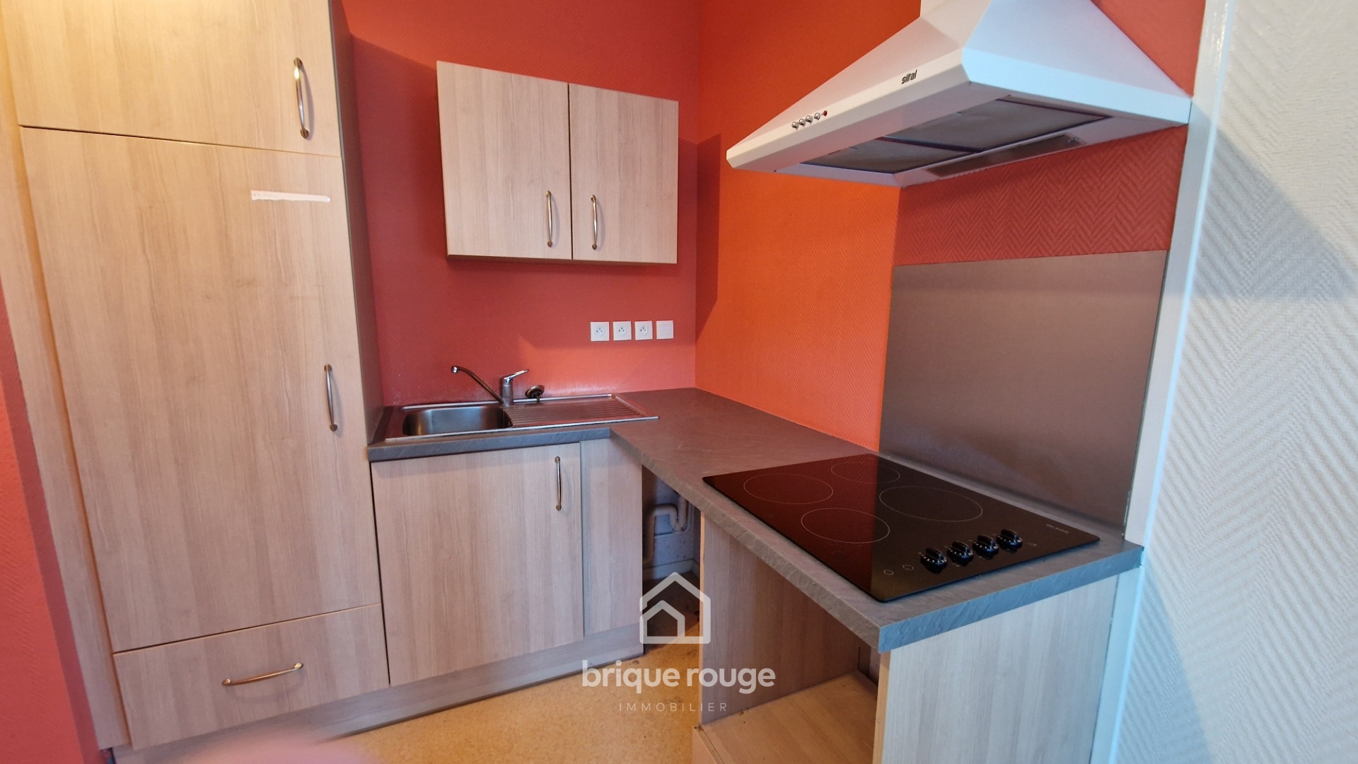 Appartement 2 chambres avec terrasse et 2 places de parking Photo 3 - Brique Rouge Immobilier