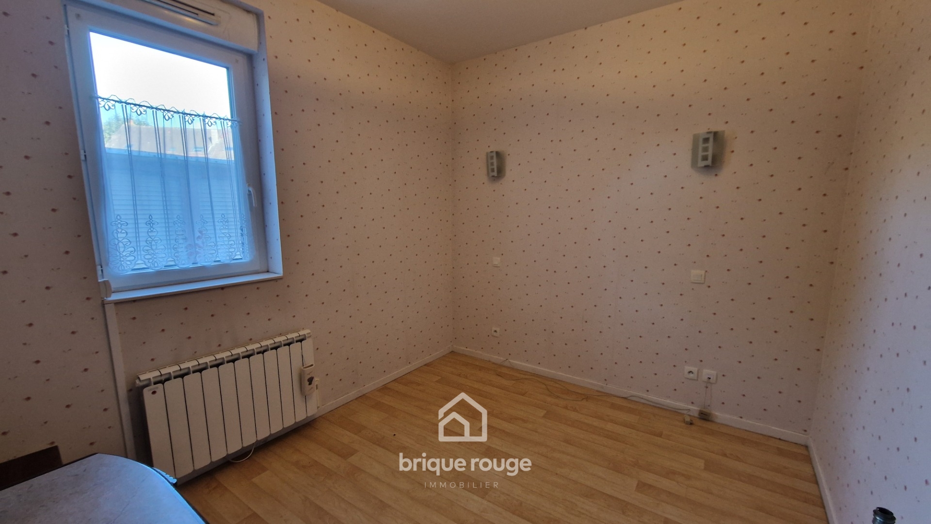 Appartement 2 chambres avec terrasse et 2 places de parking Photo 4 - Brique Rouge Immobilier