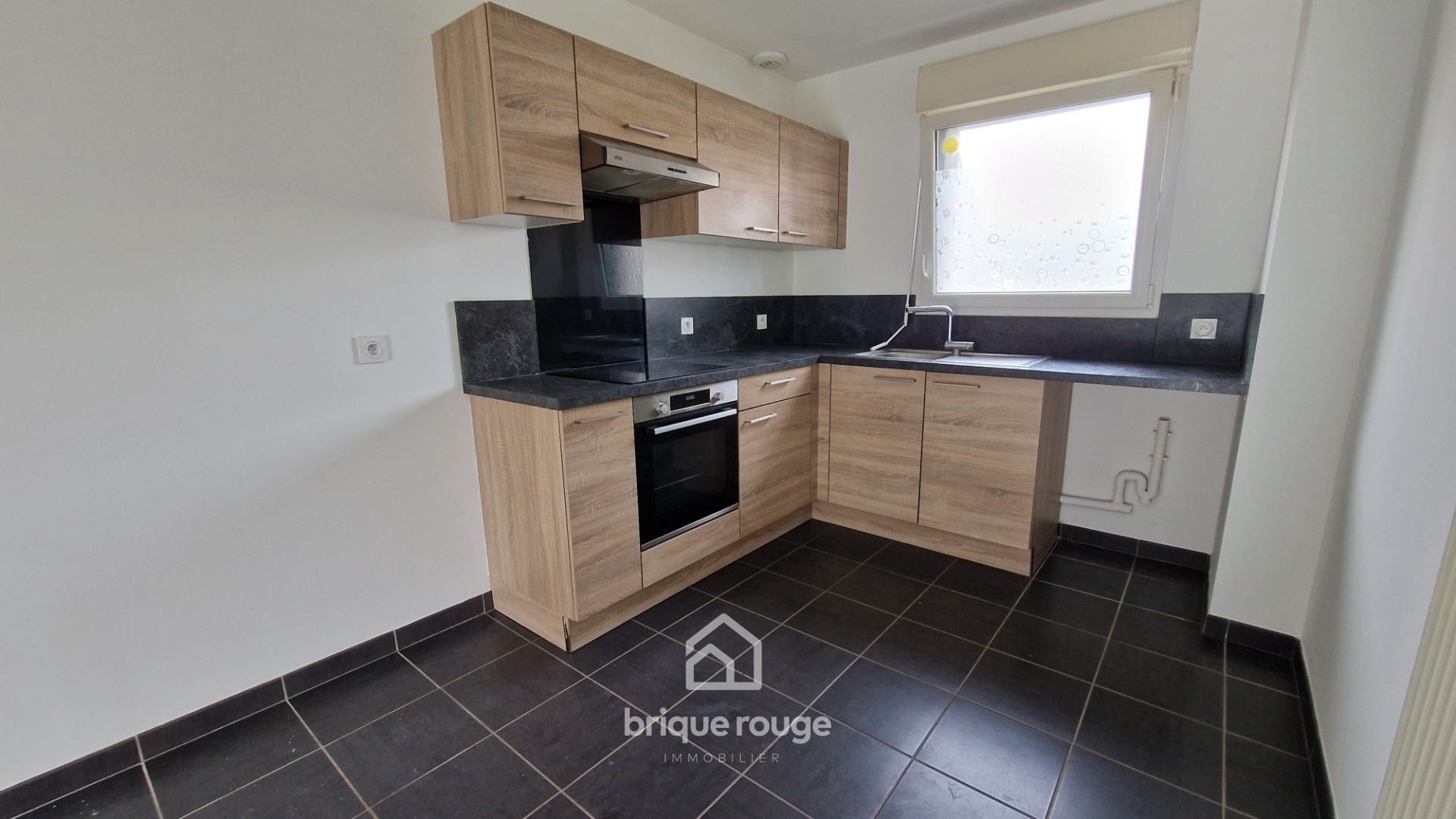 Individuelle 3 chambres  5 min  pied de la gare Photo 3 - Brique Rouge Immobilier