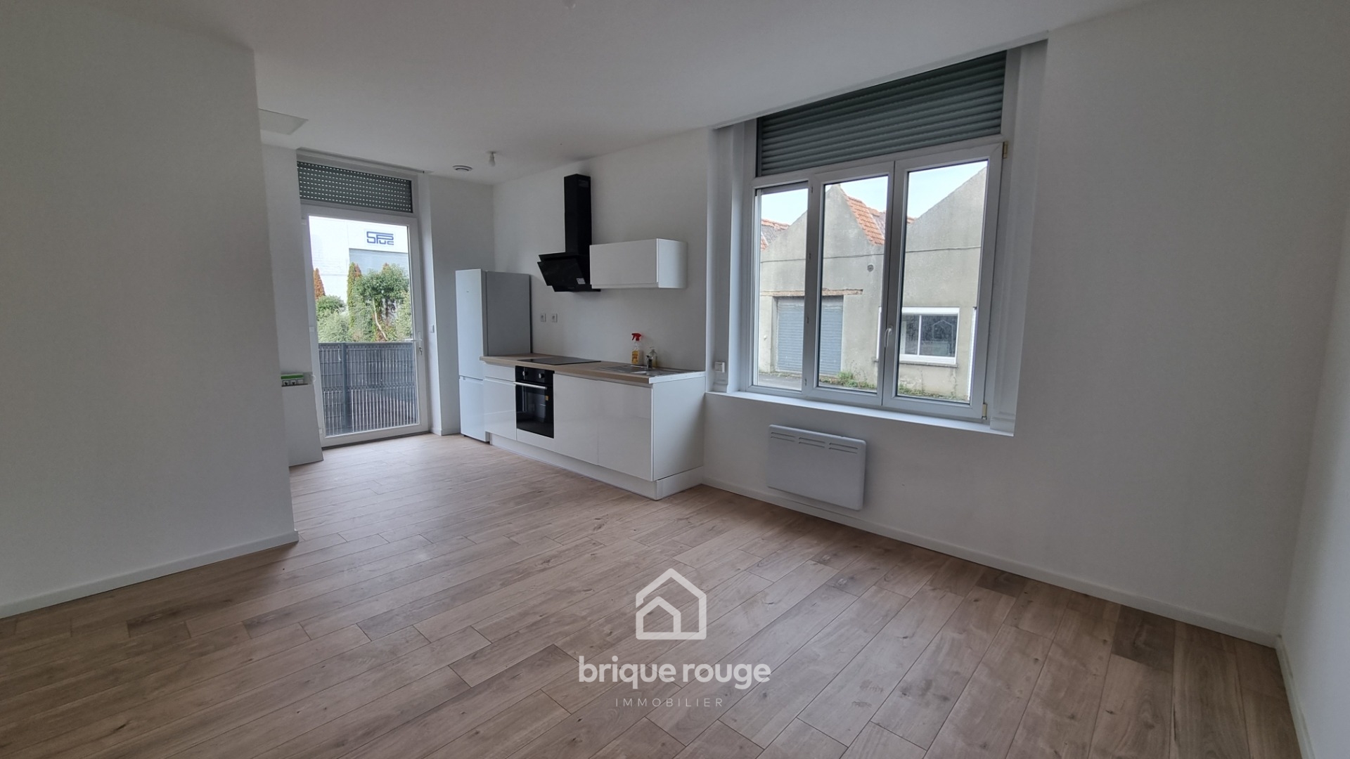 Appartement t2 en rez de chaussee Photo 1 - Brique Rouge Immobilier