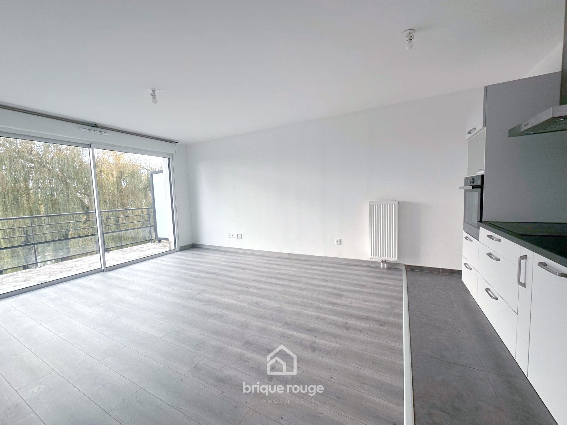 Appartement t3 60m   terrasse idealement situe  Photo 1 - Brique Rouge Immobilier